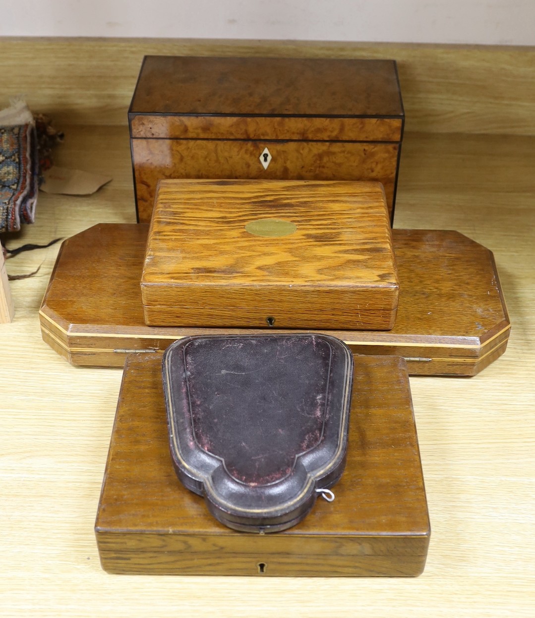 Four cased plated sets and a 19th-century burr walnut box